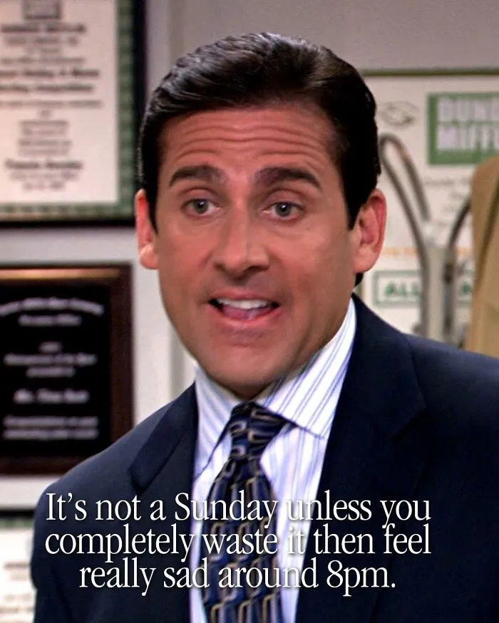 Michael Scott from The Office delivering a humorous meme about Sunday blues in a corporate office setting.