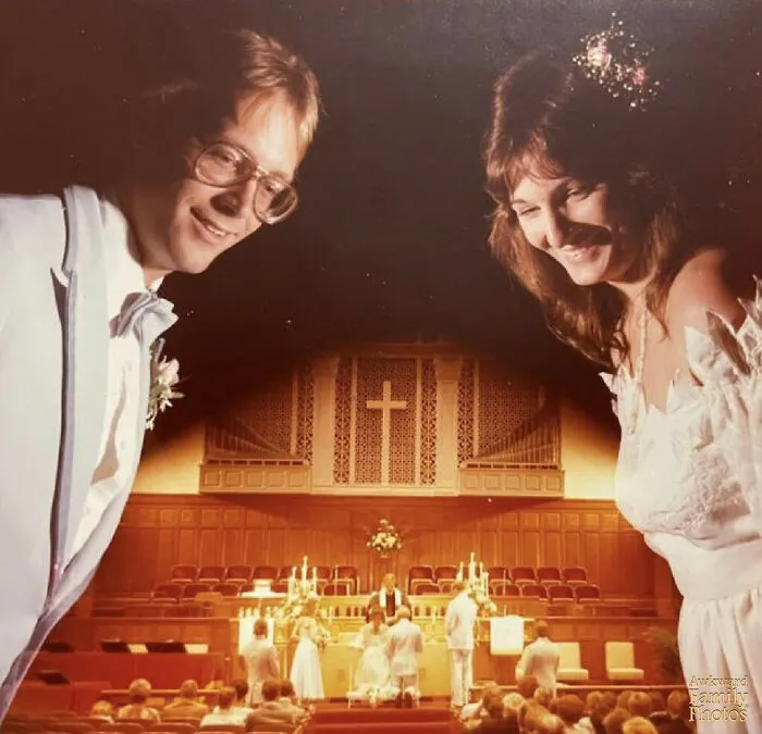 Oversized bride and groom looming humorously over their awkward wedding photo in a church ceremony setting.
