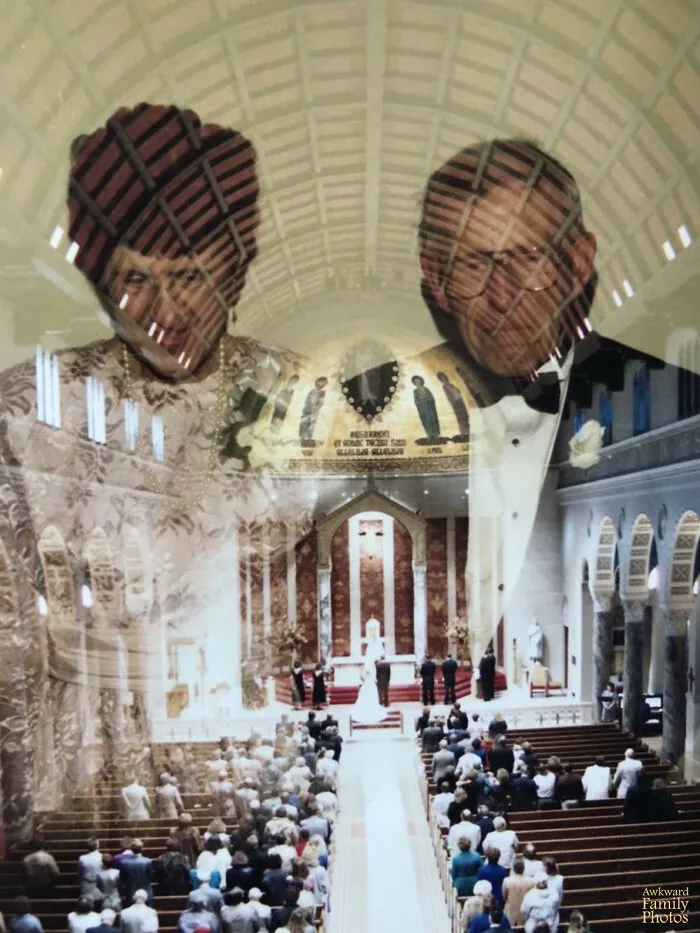 Reflection of elderly couple over crowded wedding ceremony inside church, an awkward wedding photo capturing a unique moment.