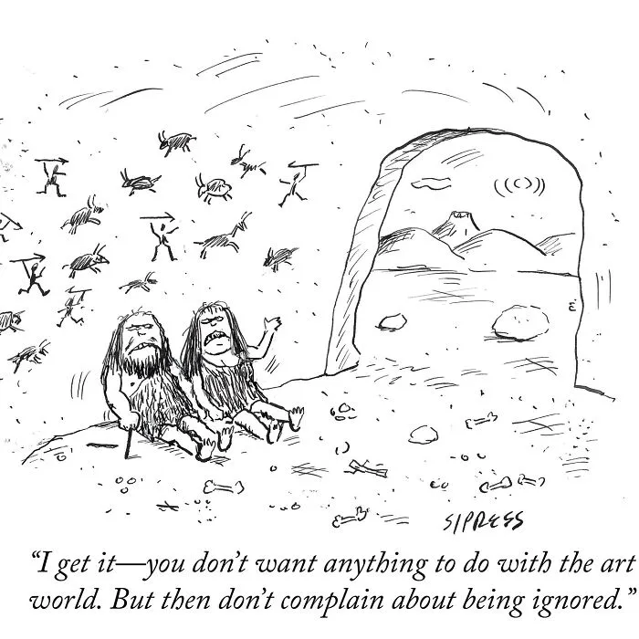 Cavepeople discussing art world indifference with humorous New Yorker cartoons by David Sipress in a prehistoric setting.