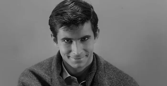 Psycho (1960) - Norman Bates presents himself as kind and vulnerable while hiding a violent reality he barely understands himself.