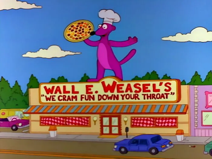 Simpsons scene showing Wall E. Weasel's pizza restaurant with a purple weasel holding a pizza on the roof and colorful signage.