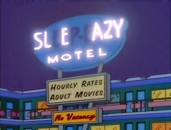 Sleepy Azy Motel neon sign from The Simpsons featuring humorous and iconic signs from the show’s episodes at night.