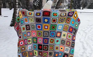 I Turned 96 Book Covers Into A Cozy Granny Square Blanket