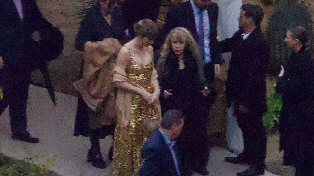 Taylor Swift Faces Backlash After Wearing "Awful" Shimmering Gown To Friend’s Wedding