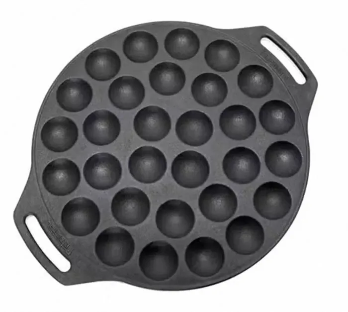 Un Poffertjespan para hacer... poffertjes. Pequeños panqueques holandeses que se comen con mantequilla y azúcar glas.