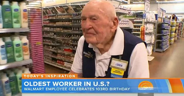 Elderly Walmart employee working in store aisles, highlighting unusual normalcy in a dystopian reality.