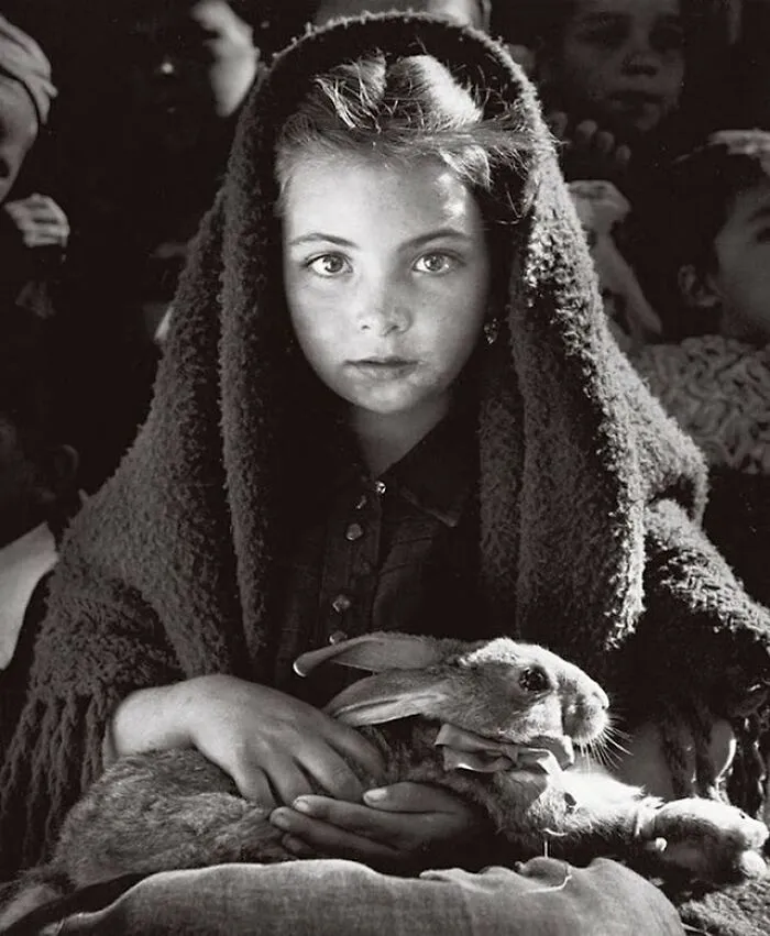 A Little Girl With Her Pet , Portugal, 1950s