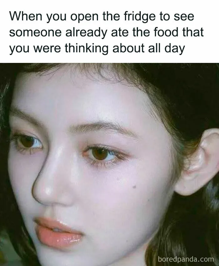 Close-up of a person looking disappointed, illustrating relatable memes about life as an introvert and food frustrations.
