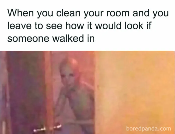 Alien peeking around door representing relatable memes about introvert life and social awkwardness after cleaning a room.