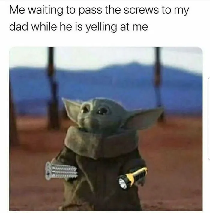 Baby Yoda holding screws and a flashlight, humorously capturing the Eastern European experience of family interactions.