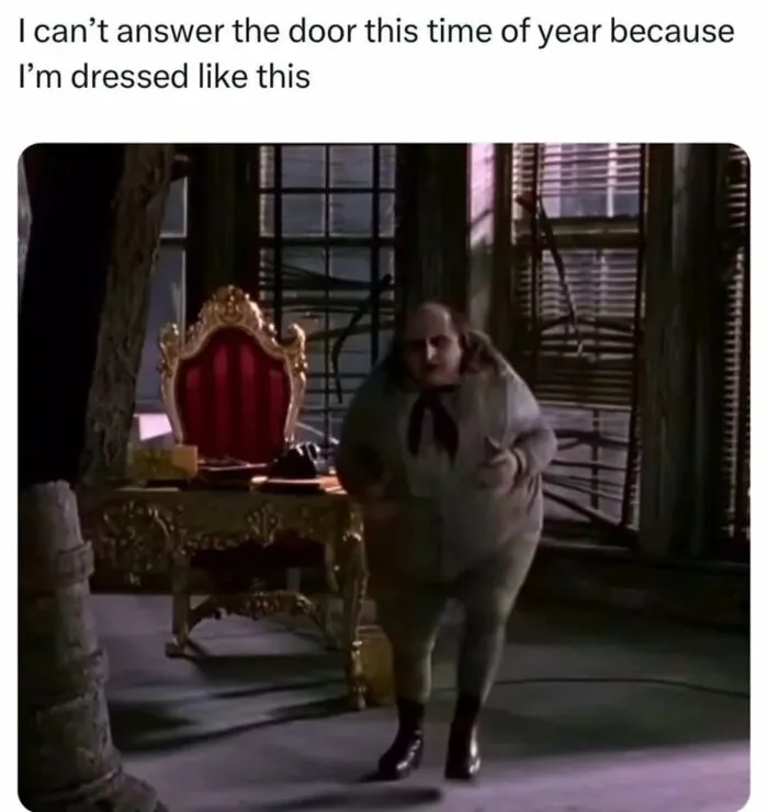 Funny meme showing a character in a bulky outfit with a red and gold throne in a dimly lit room.
