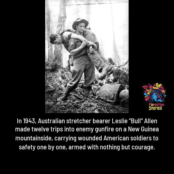 Australian stretcher bearer carrying wounded soldier in New Guinea, highlighting forgotten stories of bravery and heroism.