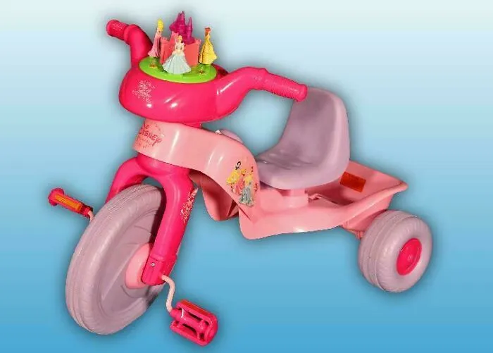 Disney Tricycle That Was Banned From Sale For Having Pointy Parts Right Where Your Little Girl's Face Is Going To Go Should She Have A Sudden Stop