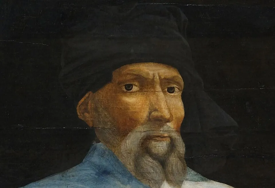 Portrait of Renaissance artist Donatello wearing a dark head covering and blue garment against a black background