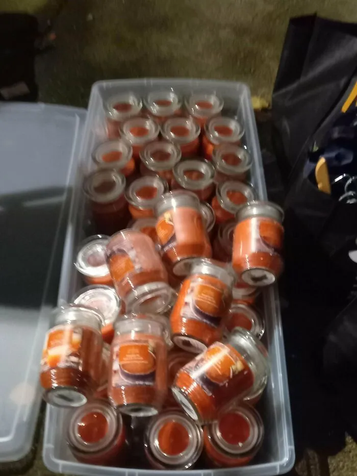 A large bin full of identical candles, a lucky dumpster diving find.