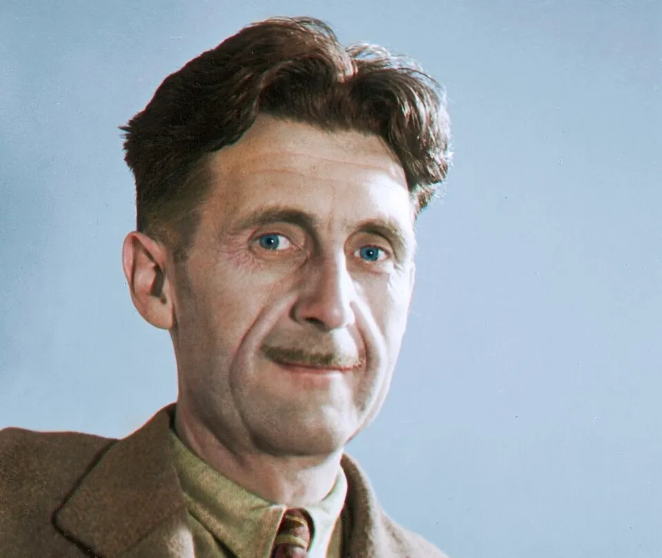 Portrait of author George Orwell with blue eyes, known for coining the term Big Brother in literature.