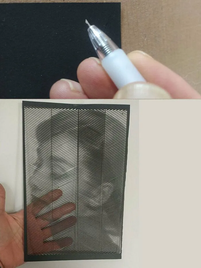 Una cuchilla, un papel, un semitono invertido recortado de una sola hoja A4.