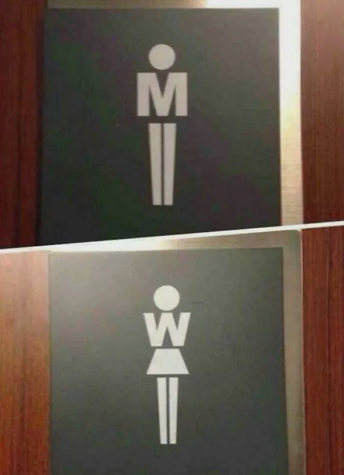 Minimalist restroom signs incorporating creative letter designs