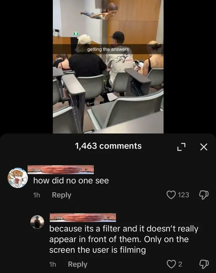 Students in a classroom using a filter to depict "getting the answers," illustrating people so dumb you might feel your IQ drop.