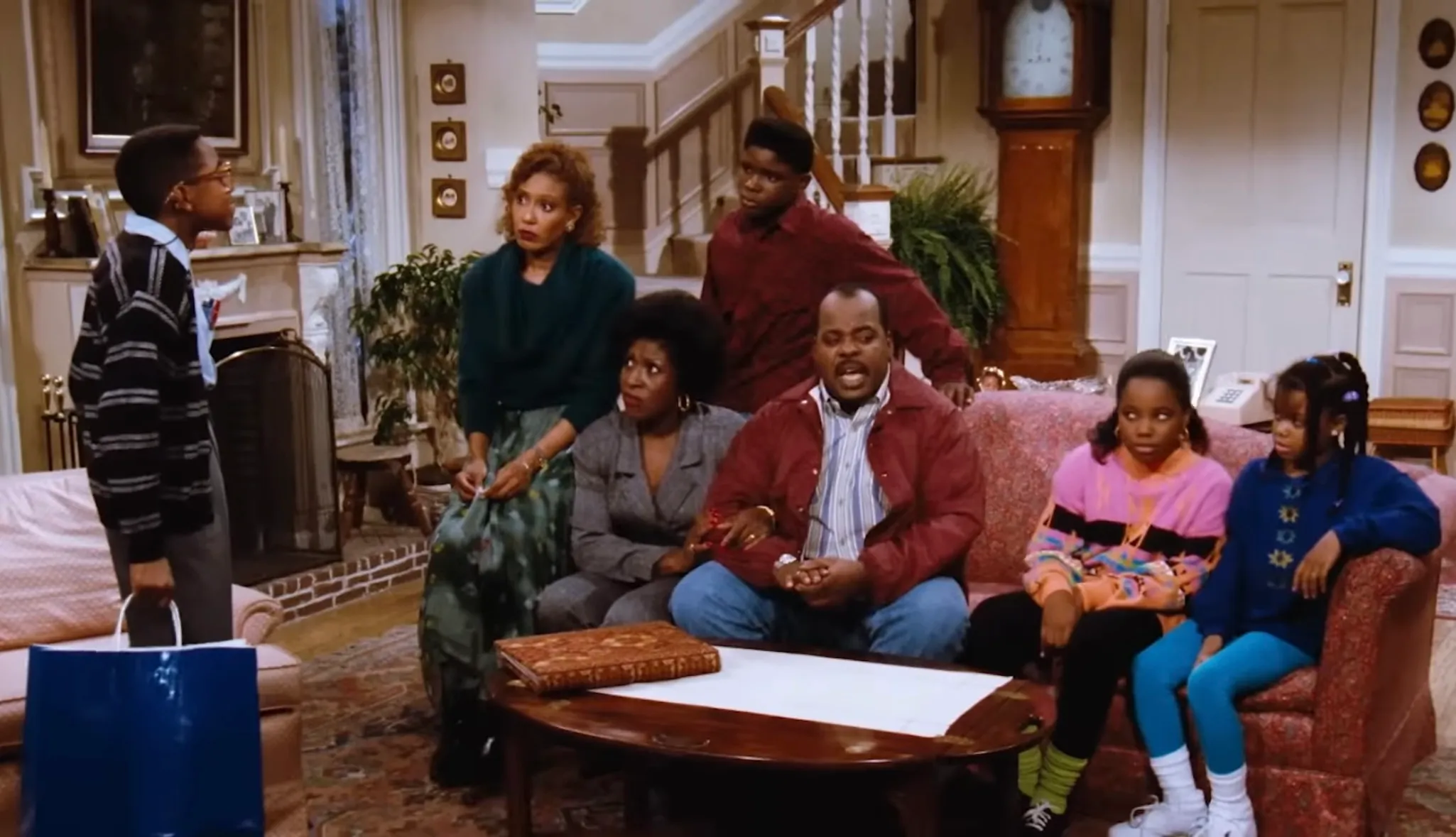 The Winslows family gathered in a living room scene from the TV show Family Matters.