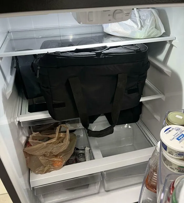 Coworkers Lunch Box In The Break Room Fridge