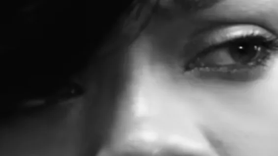 Close-up of a person's eyes with intense focus, highlighting the concept of celebrity eyes staring directly.