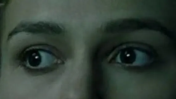 Close-up of celebrity eyes with intense gaze, capturing the essence of who's staring at you here in mystery.
