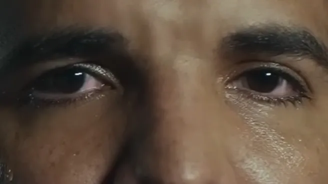 Close-up of celebrity eyes showing detailed skin texture and dark irises for the Celebrity Eyes quiz.
