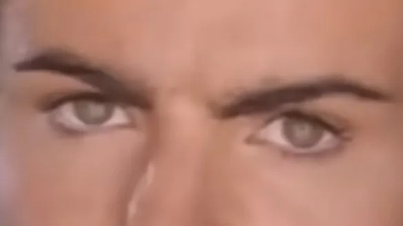 Close-up of a celebrity's eyes making direct eye contact, highlighting the intensity of celebrity eyes.