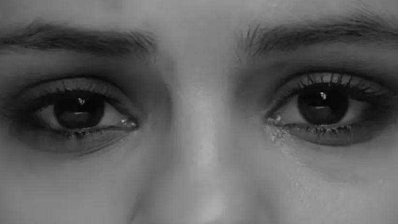 Close-up of a person's eyes in black and white, focusing on the detailed features for celebrity eyes matching.