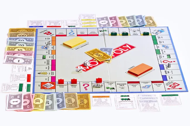 Classic board game Monopoly set up with money, dice, and property cards ready for a fun game night instead of Risk.