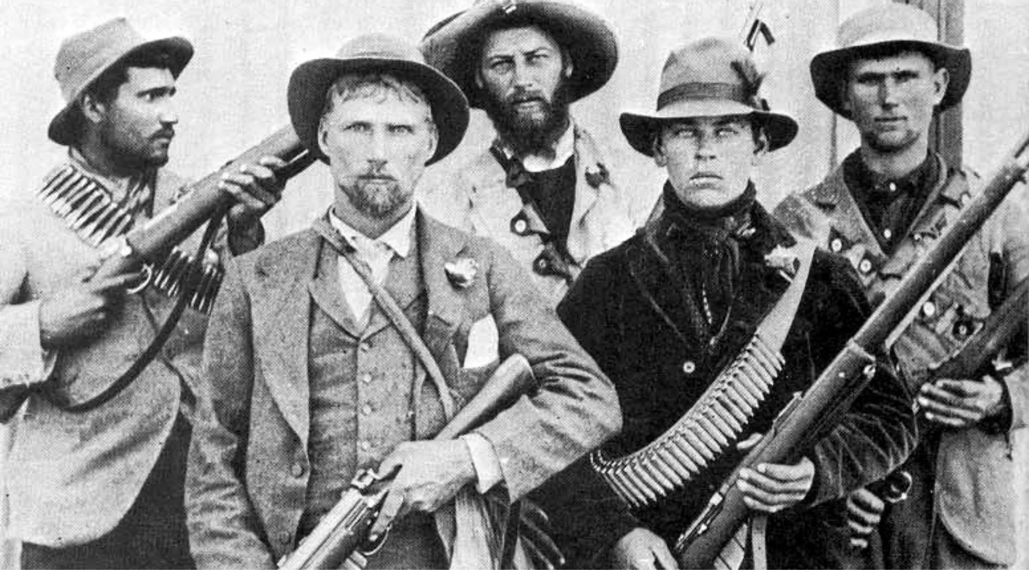 Boer fighters in South Africa armed with rifles and bandoliers during the conflict with the British Empire.