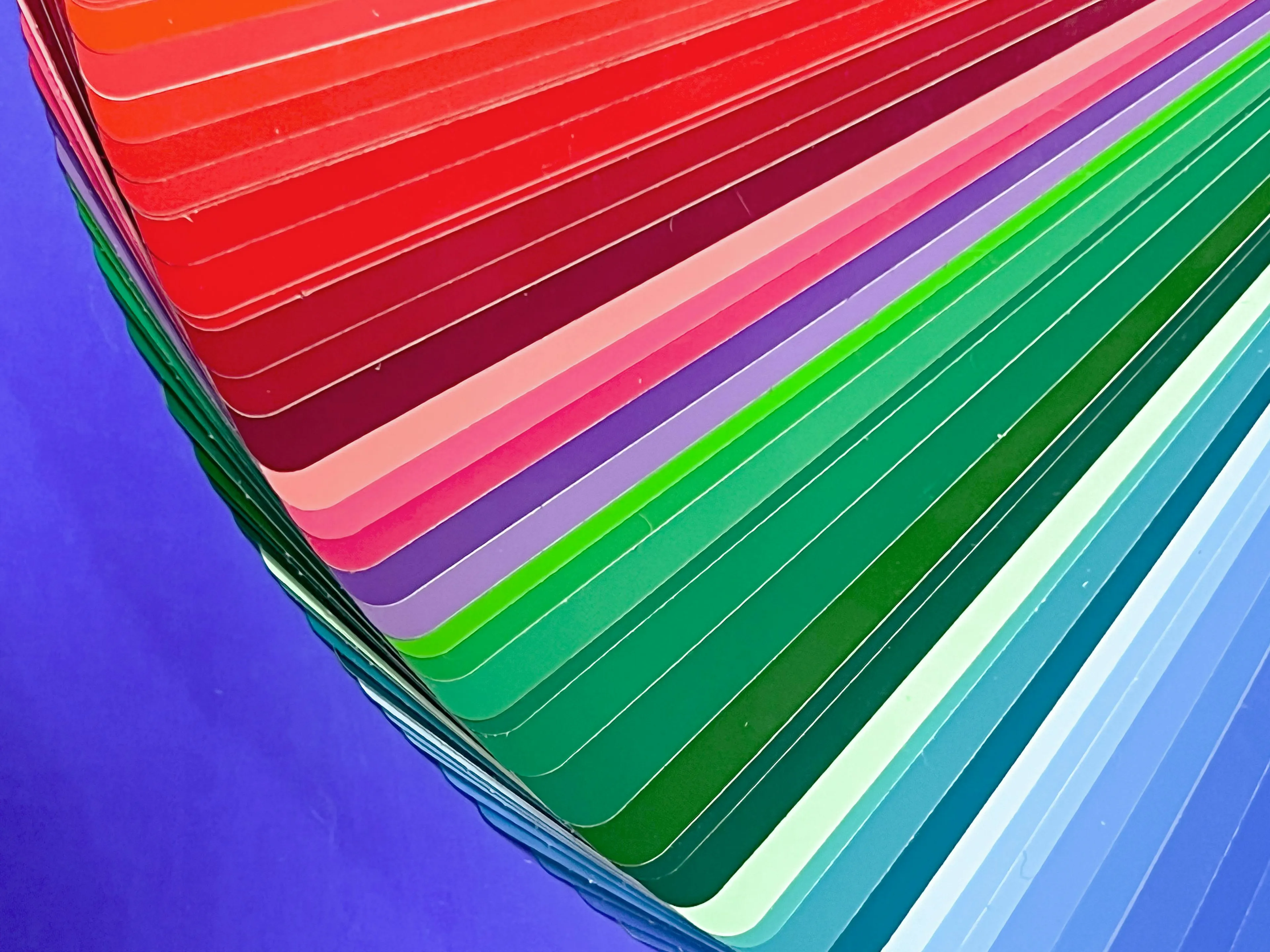 Color swatches arranged in a gradient showcasing the element of art related to lightness and darkness of colors.