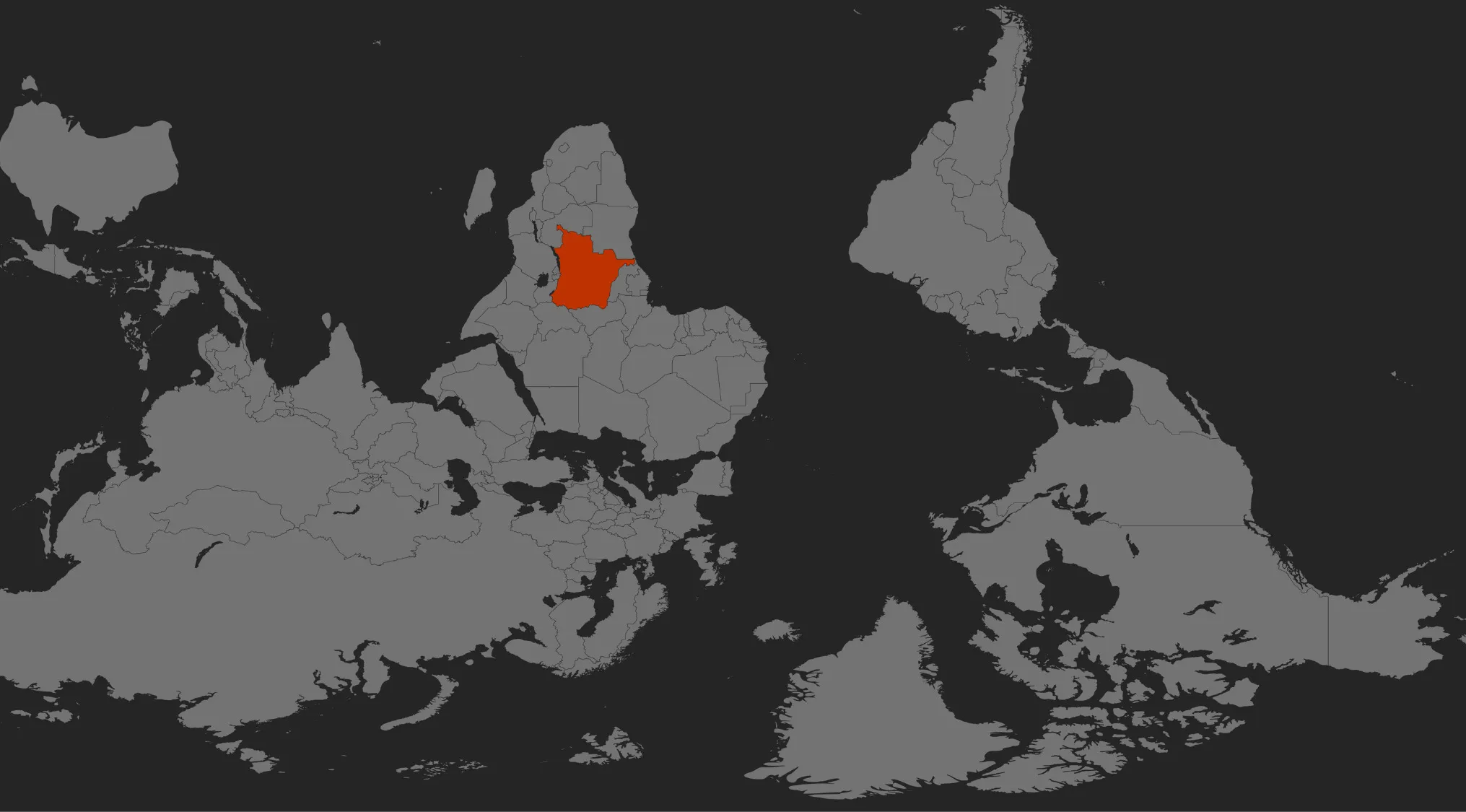 Mirrored world map highlighting a specific country in orange for a geography challenge to guess the country shown.