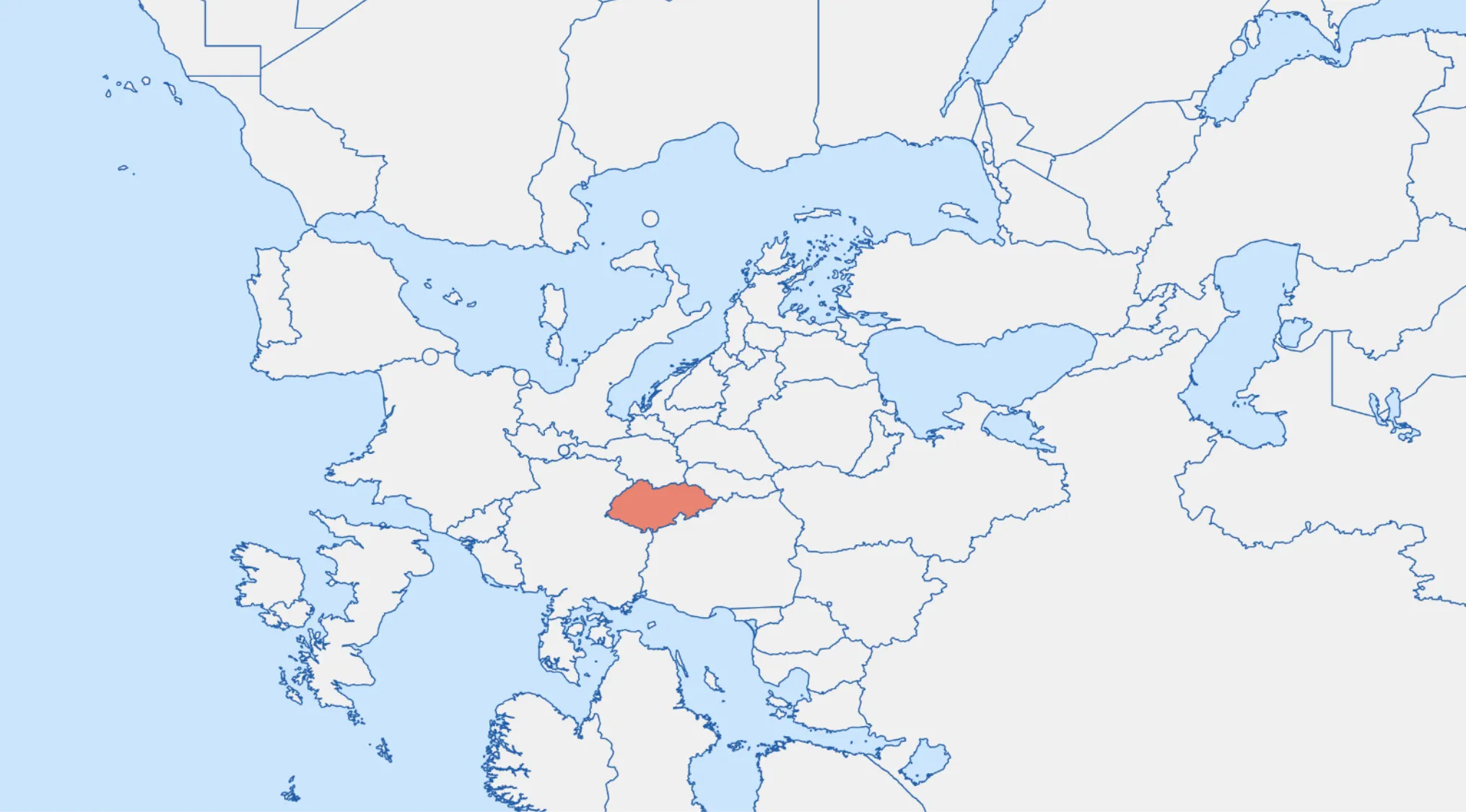 Mirrored map highlighting a European country in red for a geography challenge to identify the country from its shape.