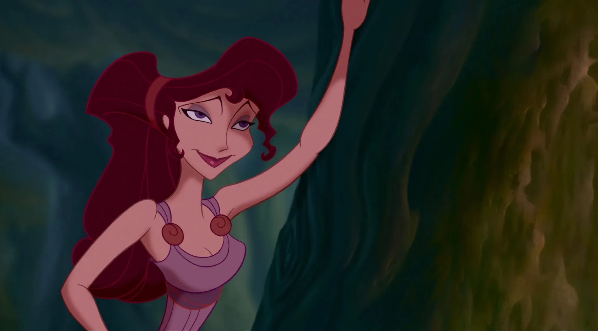 Disney character with red hair posing by a tree, testing how well you know Disney characters and their movies.