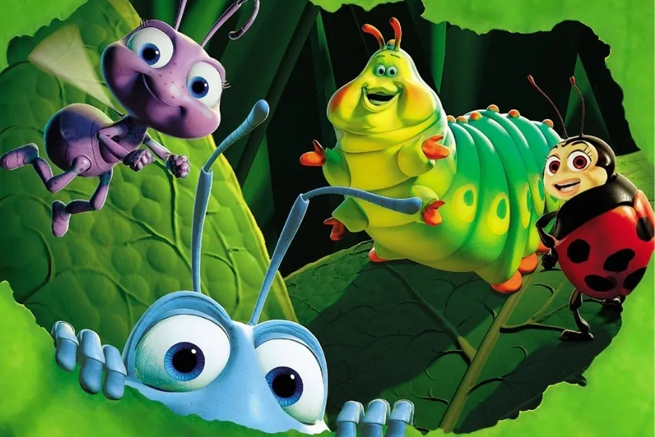 Colorful animated characters from Pixar's A Bug's Life on green leaves in a vibrant natural setting.