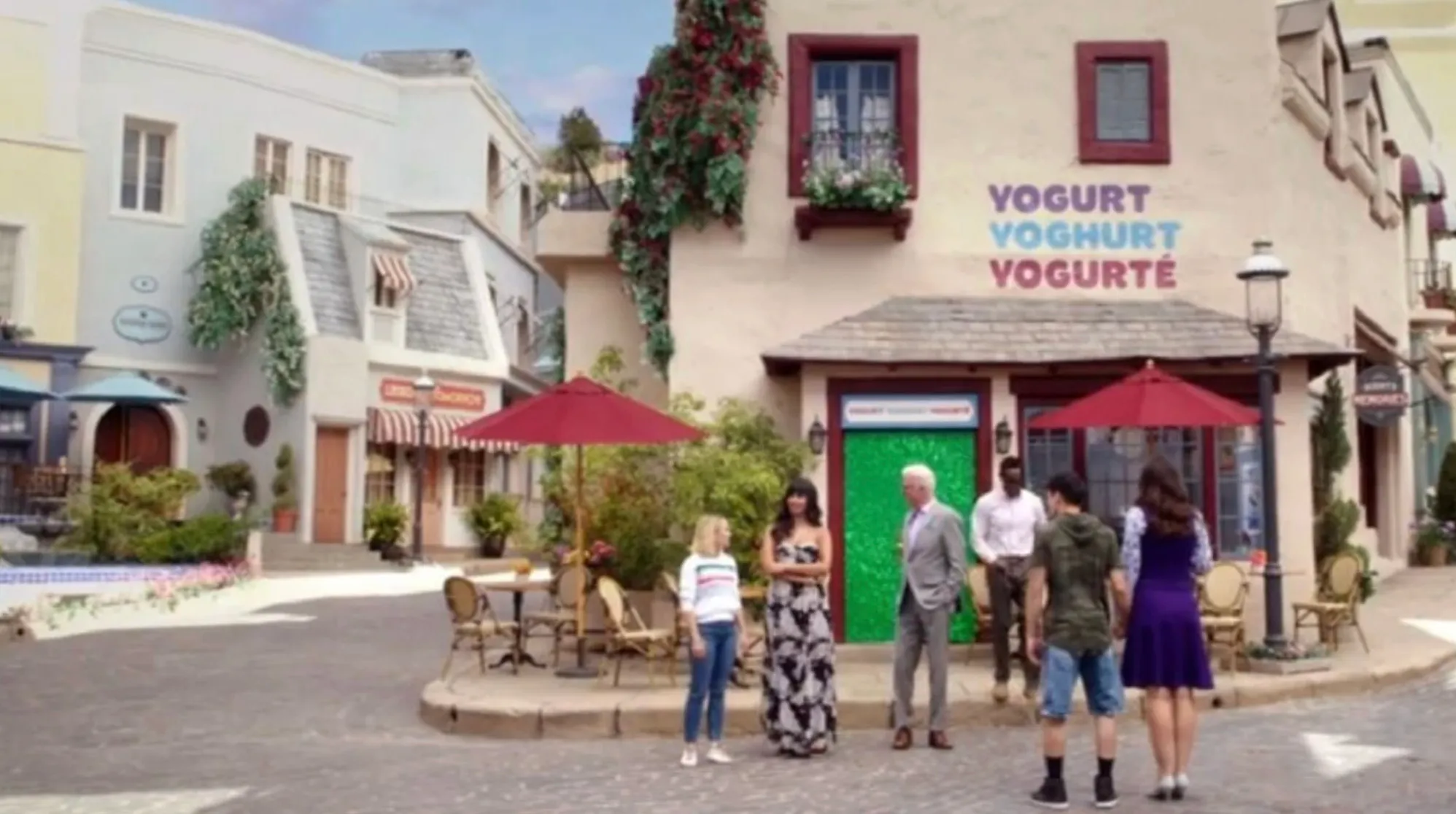 Scene from The Good Place TV series showing characters outside a yogurt shop in the fictional Good Place neighborhood.