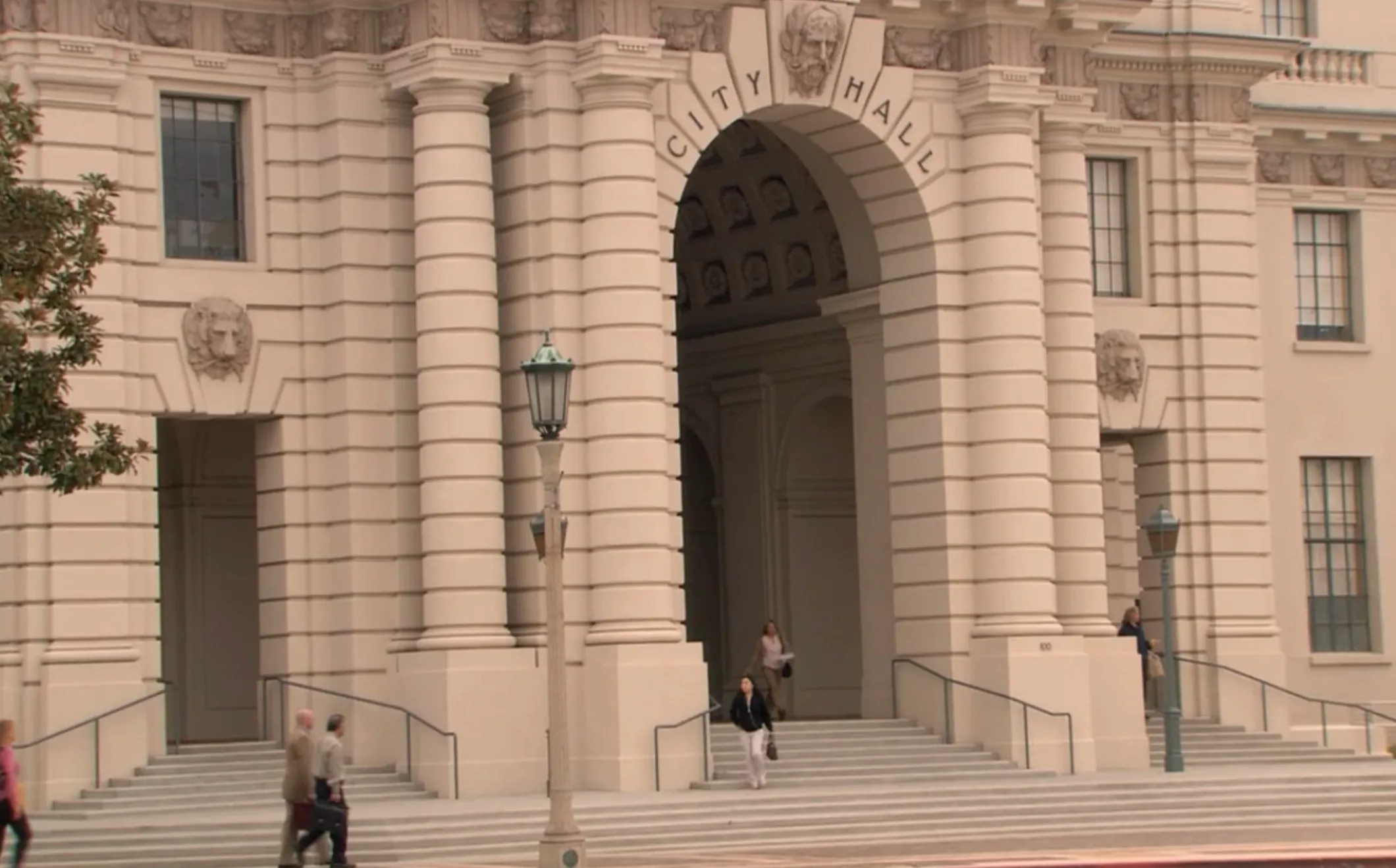 City Hall building with people walking on steps, representing fictional locations in TV shows including Pawnee town.