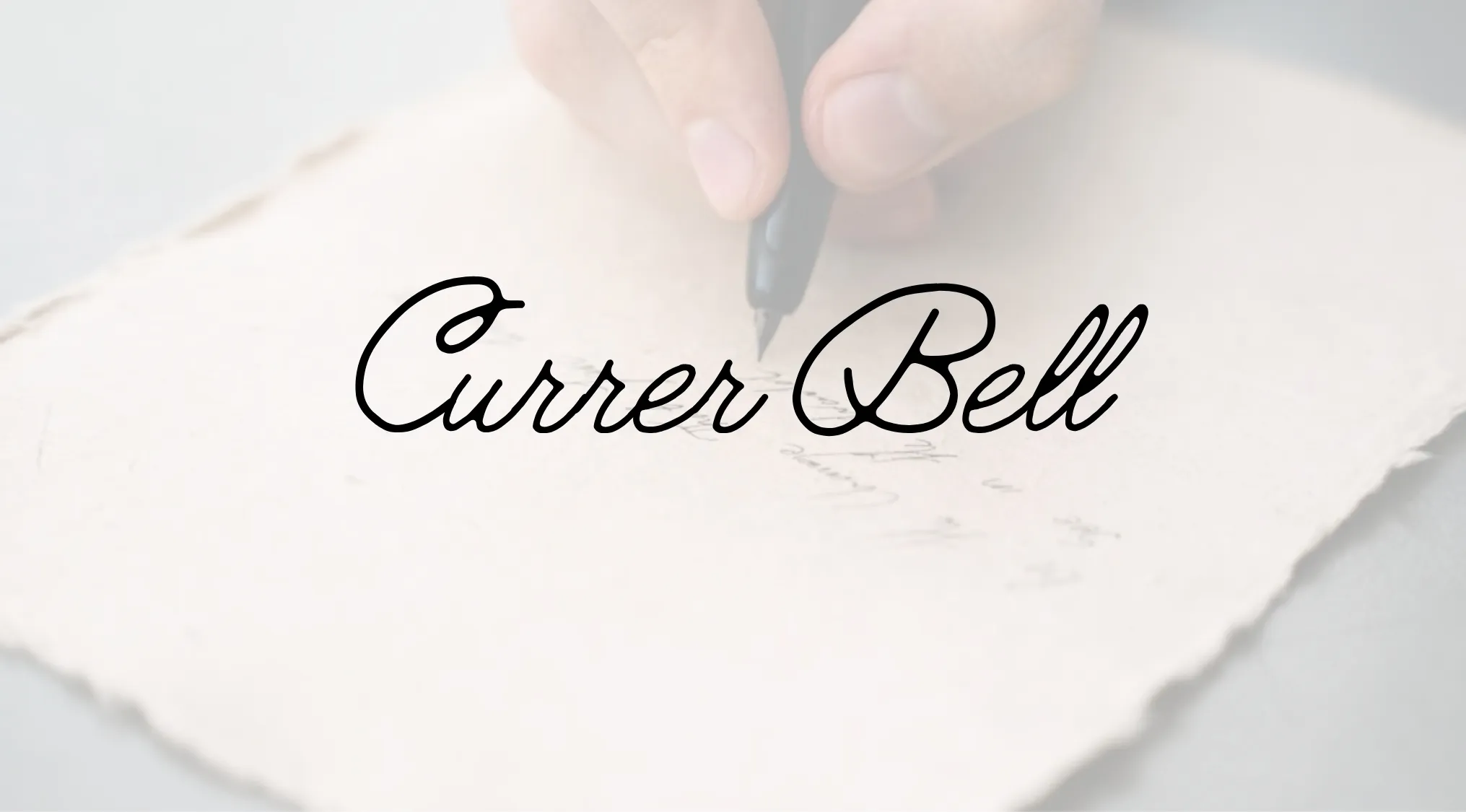 Hand writing Currer Bell on a vintage paper, representing the author who wrote under the pen name Currer Bell.