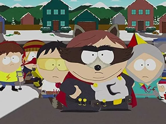 Animated characters from South Park including Eric Cartman in superhero costume with snowy neighborhood background.