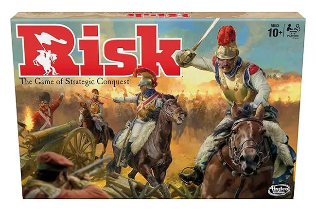 Risk board game box featuring historical soldiers on horses and cannons ready for strategic conquest play.