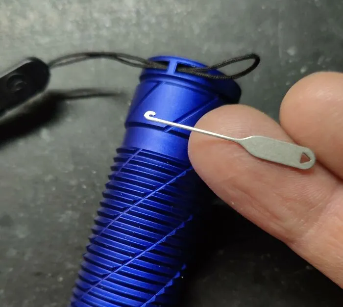 A Little Hook Tool To Pull Through Those Tiny Straps That Come With A Lot Of Devices
