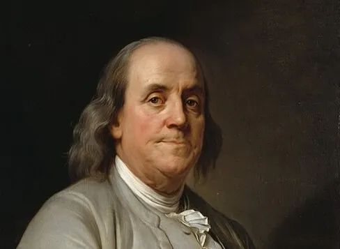Portrait of Benjamin Franklin in 18th-century attire with a neutral expression against a dark background.