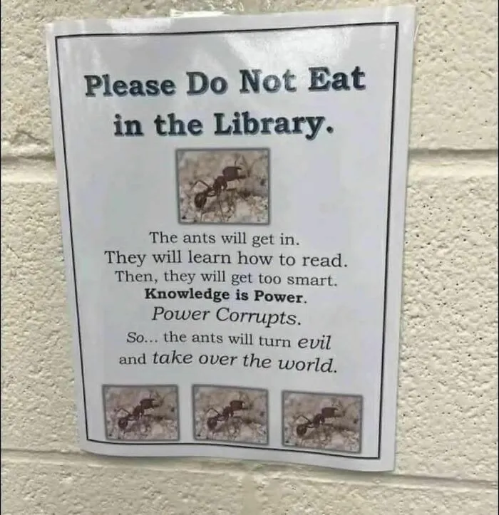 Funny strange sign in a library warns ants will learn to read, get smart, and take over the world.