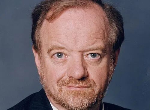 Close-up portrait of Robin Cook, UK political figure and former Secretary of State, against a plain background.