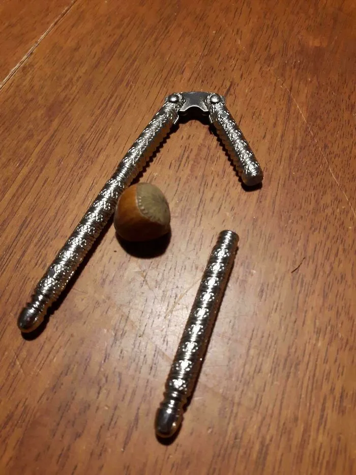 A nutcracker and a hazelnut, symbolizing a 400% price difference in consumer goods.