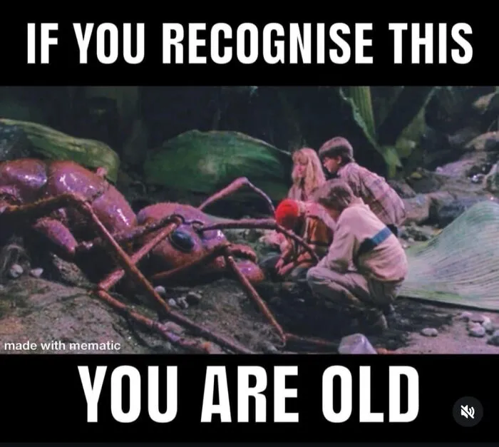 Children next to a giant ant in a scene from Honey, I Shrunk the Kids, taking you way back.