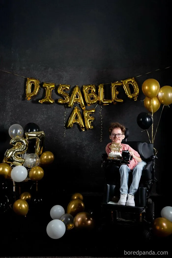 Person in wheelchair celebrating birthday with disabled balloons